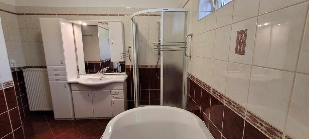 Kúpeľňa v ubytovaní Aranypatkó Fogadó-Étterem