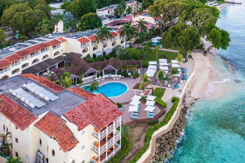 uma vista aérea do resort e do oceano em Tamarind by Elegant Hotels - All-Inclusive em Saint James