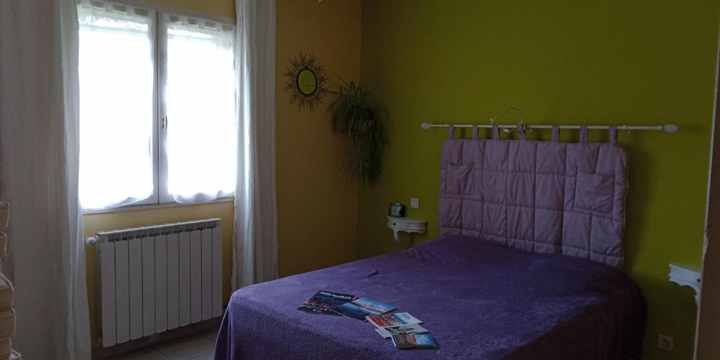 Postel nebo postele na pokoji v ubytování Le Ranch du Lion