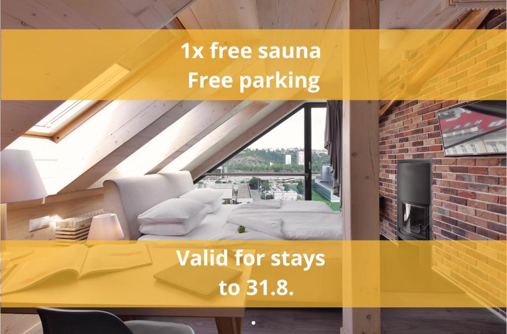 a advertisement for k fire samurai free parking in a living room at Absolutum Wellness Hotel in Prague