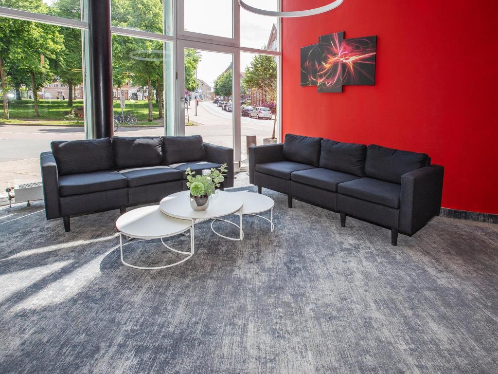 Posezení v ubytování DORMERO Hotel Bargenturm Lüneburg