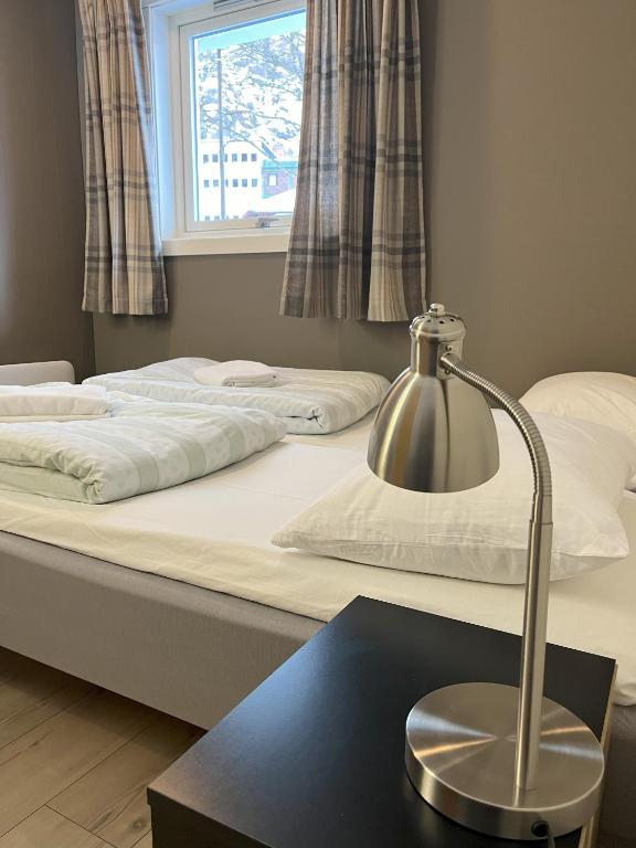 Postel nebo postele na pokoji v ubytování Birkelunden Bed & Breakfast