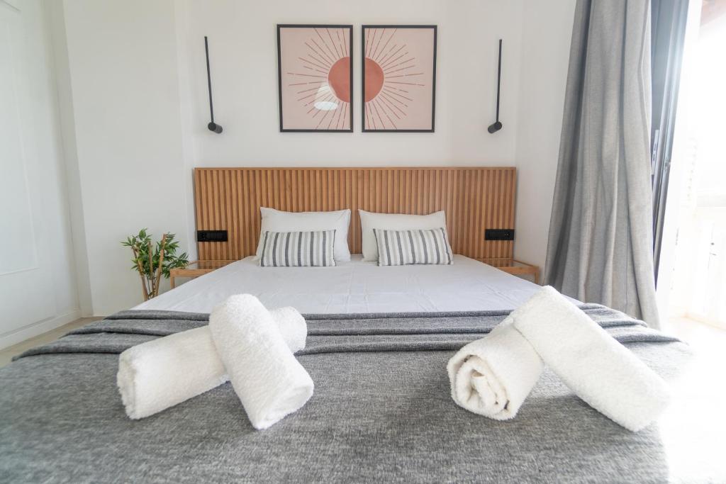 Postel nebo postele na pokoji v ubytování Airy Flat at Xenios Avlais