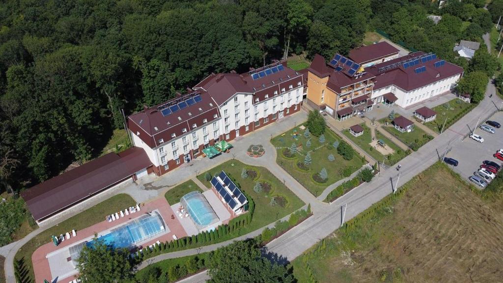 an aerial view of a large building with a parking lot at VitaPark Sonyachnyy Provans in Satanov