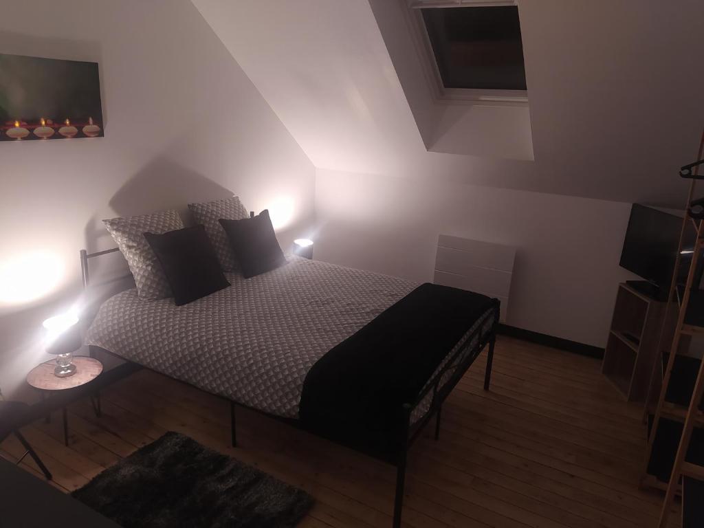 Postel nebo postele na pokoji v ubytování DS Harmothe