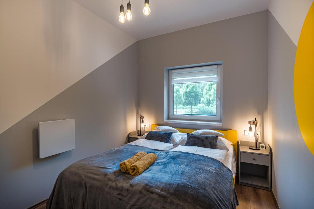 Postel nebo postele na pokoji v ubytování Balatonic Lemon apartmanház