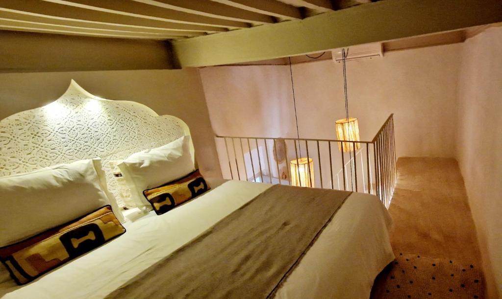 Postel nebo postele na pokoji v ubytování Riad de Vincent