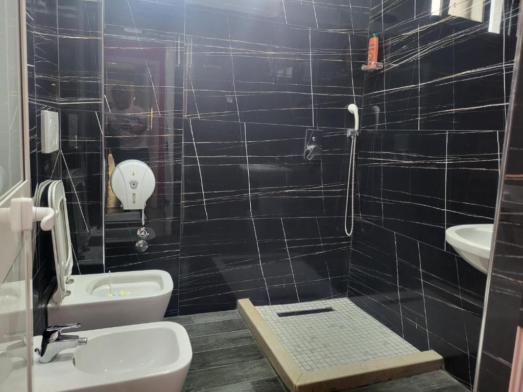 Koupelna v ubytování Hotel Europa