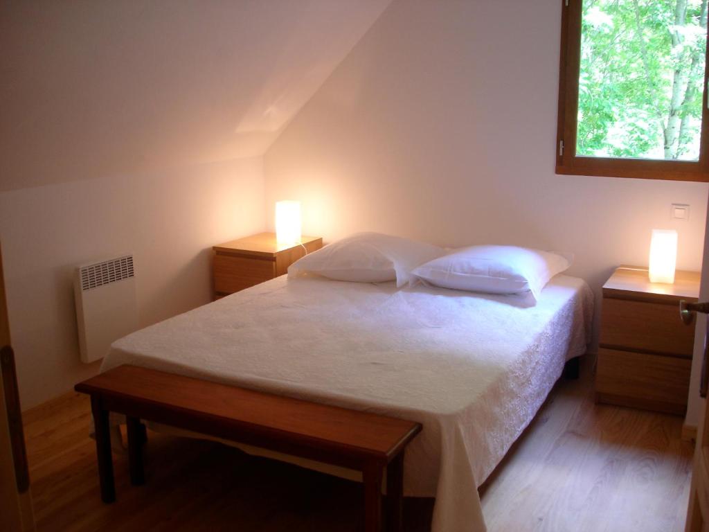 Postel nebo postele na pokoji v ubytování Le Clos de la Bergerie by CamiLodge