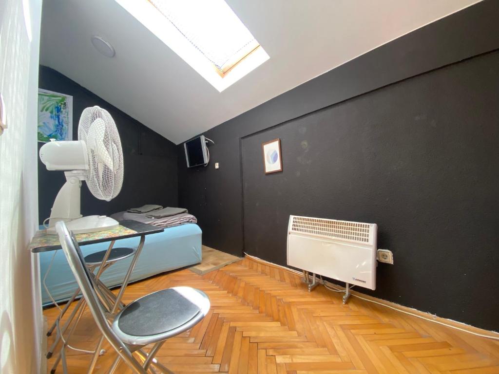 Posezení v ubytování SAGR ROOMS shared toilet and kitchen