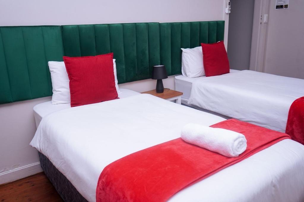 Postel nebo postele na pokoji v ubytování Safi Suites and Conference Centre