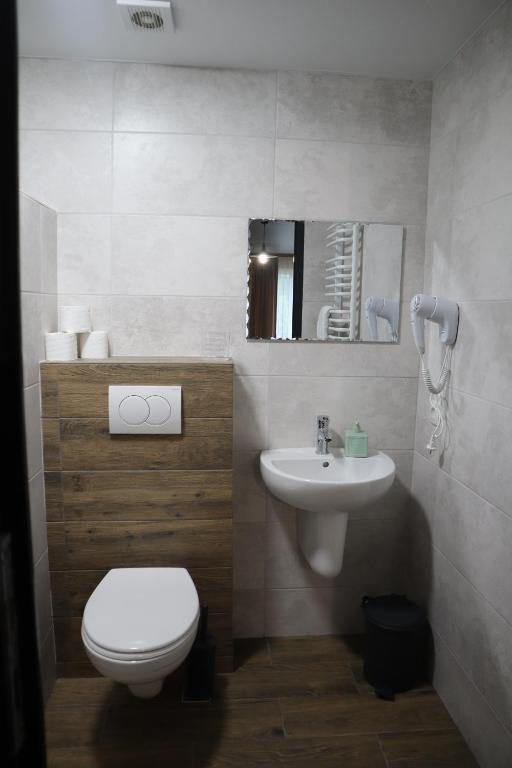 Koupelna v ubytování Aqua Hotel