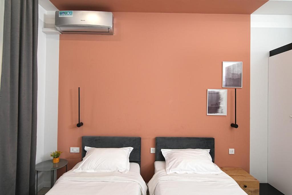 Postel nebo postele na pokoji v ubytování Sweet Home Apart-Hotel
