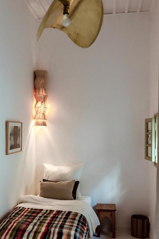 Postel nebo postele na pokoji v ubytování Riad Petite Rêverie
