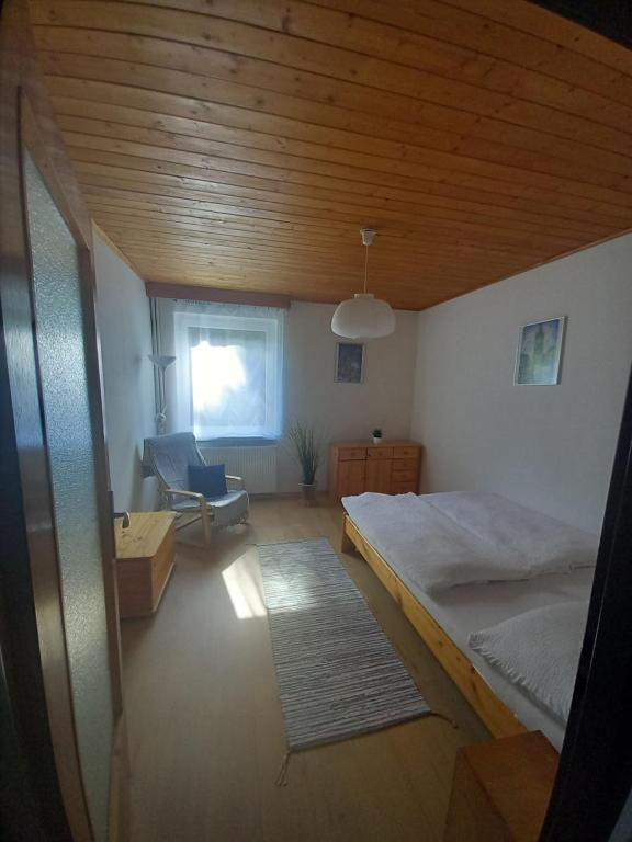 Postel nebo postele na pokoji v ubytování Penzion U Sochoru