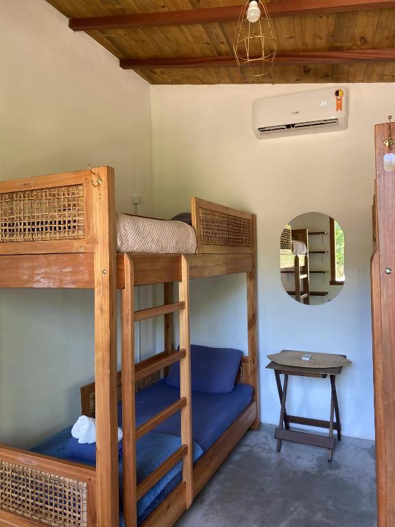 Postel nebo postele na pokoji v ubytování Vulva Caraíva Hostel e Pousada para Mulheres