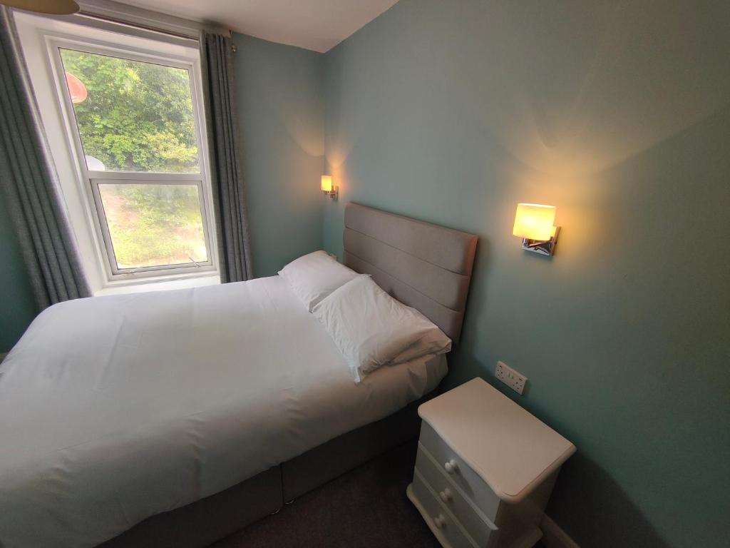 Letto o letti in una camera di Station View Tavern