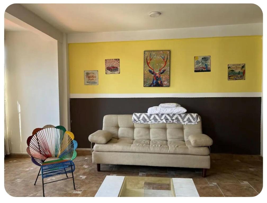 Istumisnurk majutusasutuses Apartamento Familiar Complejo Acuático, centros Médicos y Polideportivo