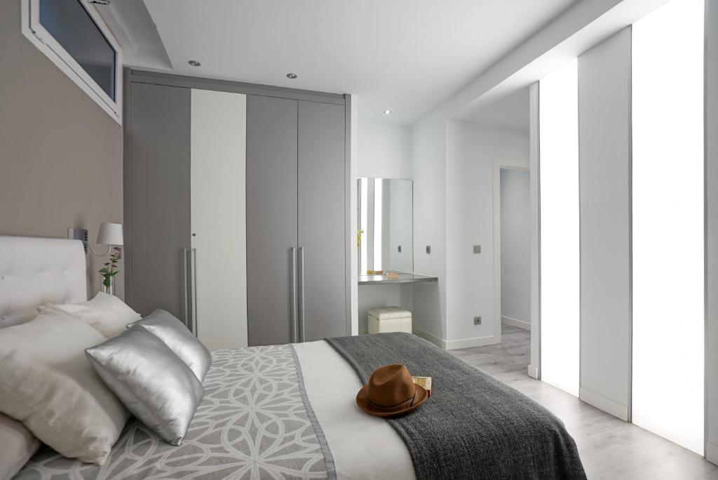 Posteľ alebo postele v izbe v ubytovaní Apartamento Lagun Concha Beach