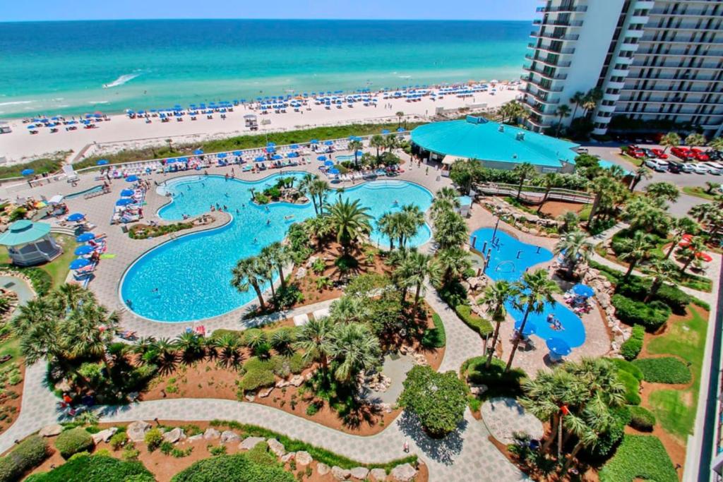 an aerial view of a resort with a beach at Edgewater Golf Villa 605 in Panama City Beach