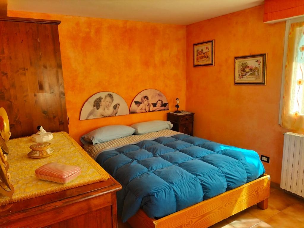 Łóżko lub łóżka w pokoju w obiekcie Il Cantinoccio B&B