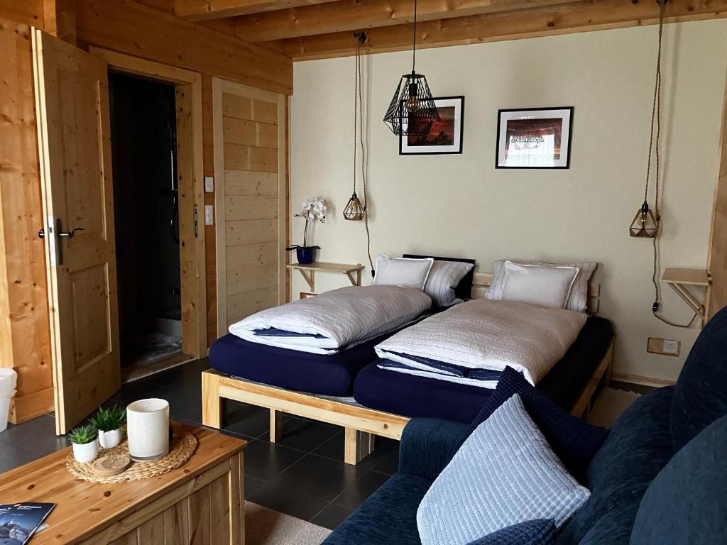 Postel nebo postele na pokoji v ubytování Chalet Alpina Gyger