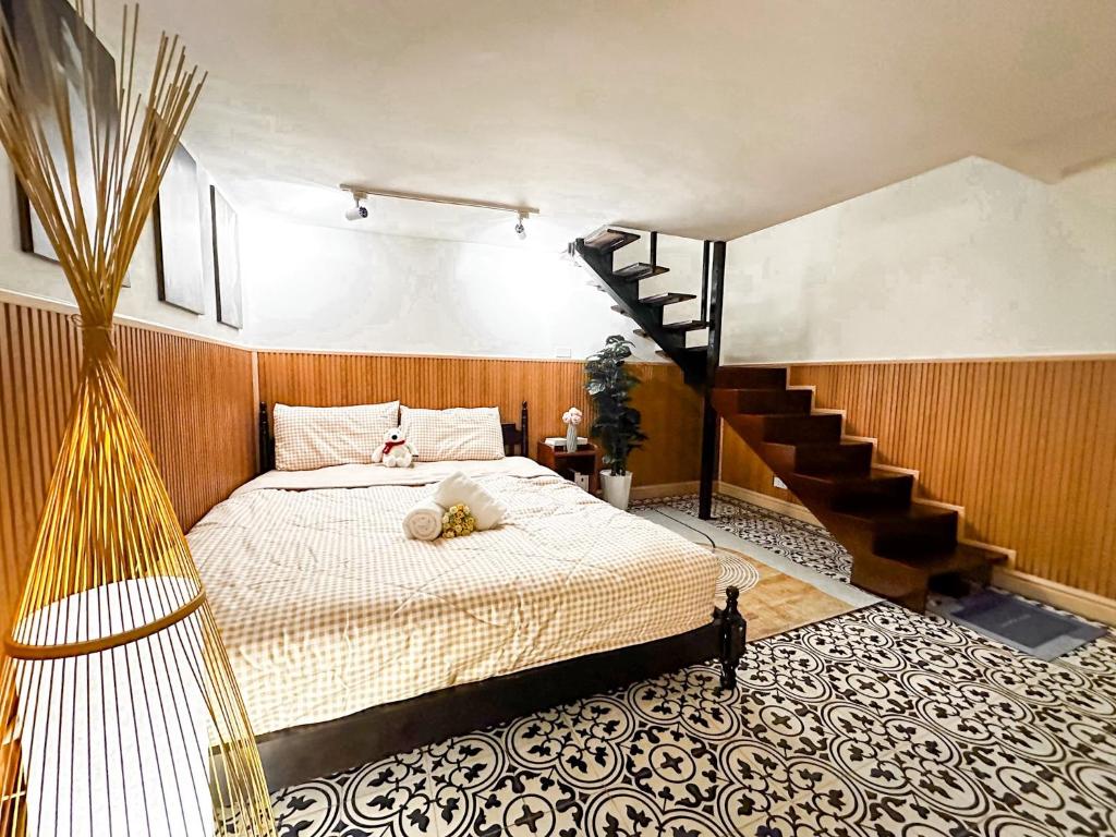 Postel nebo postele na pokoji v ubytování La Casa Di Dicembre 36B Trần Hưng Đạo