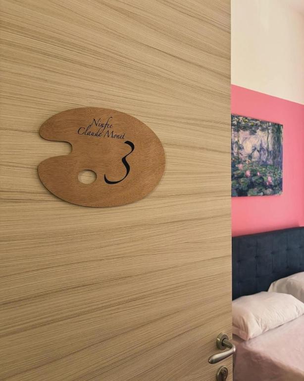 Postel nebo postele na pokoji v ubytování Il dipinto
