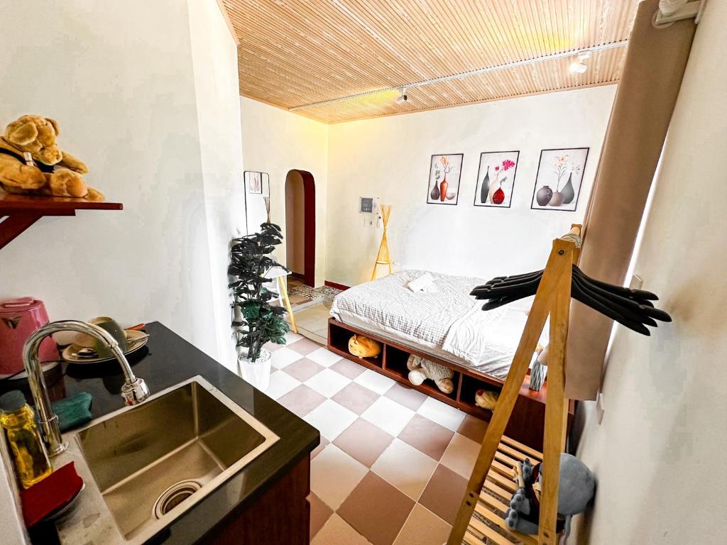 Postel nebo postele na pokoji v ubytování La Casa Di Dicembre 36B Trần Hưng Đạo