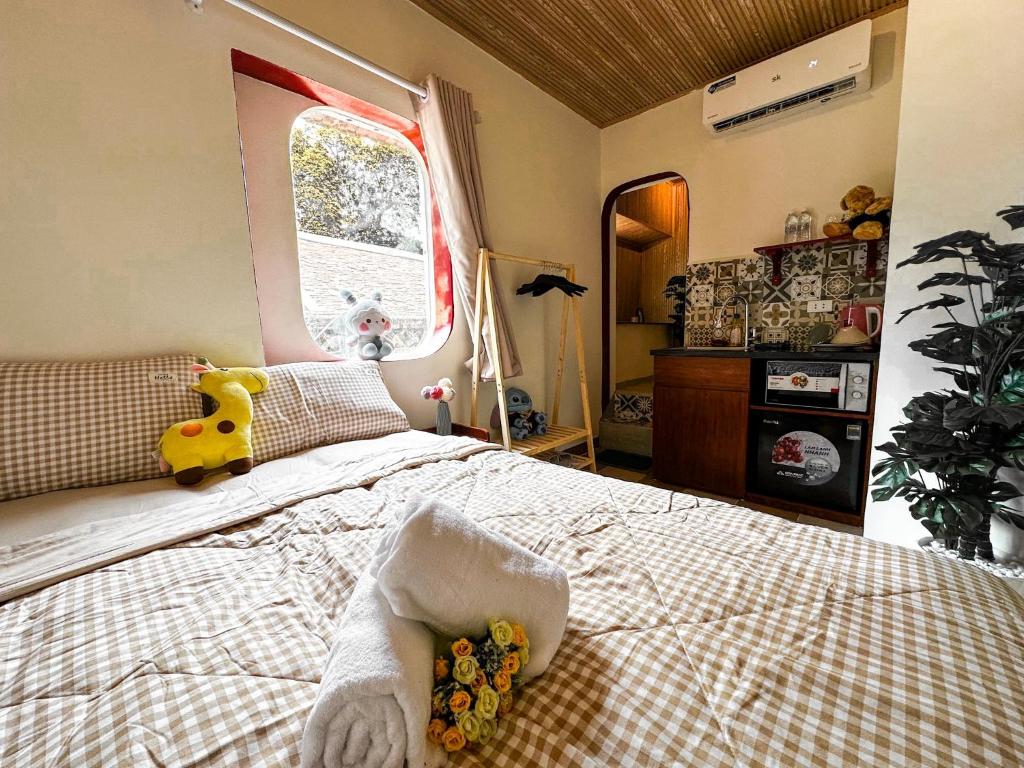 Postel nebo postele na pokoji v ubytování La Casa Di Dicembre 36B Trần Hưng Đạo