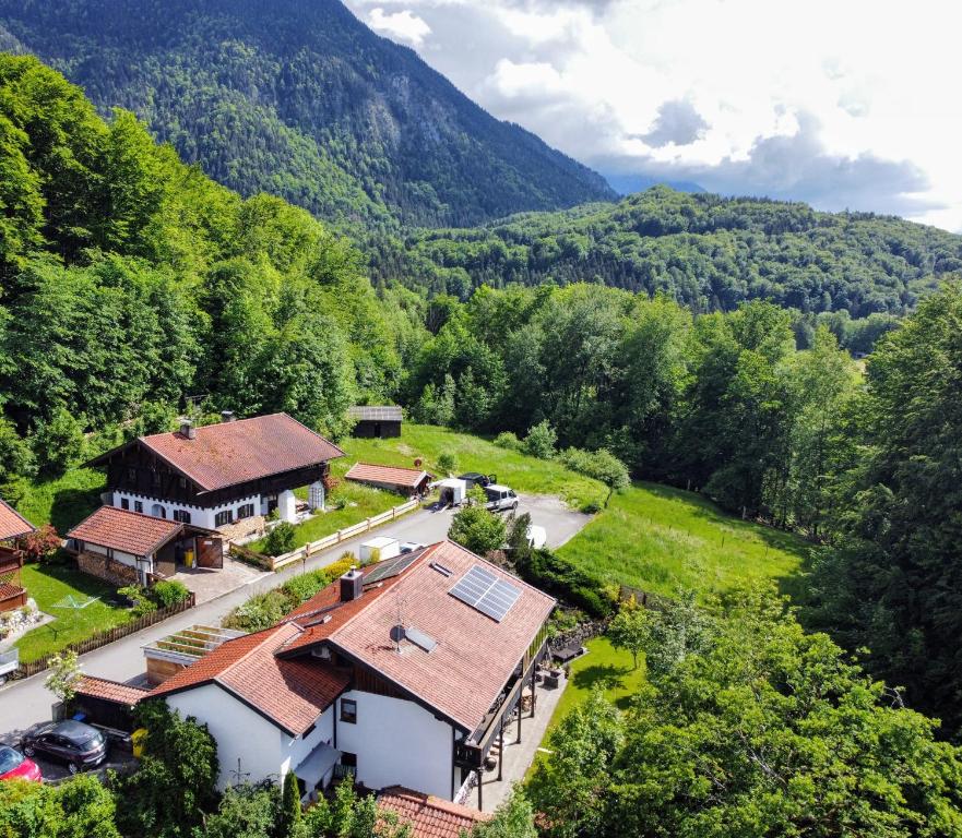 an aerial view of a house in the mountains at Ferienapartment Opitz - Zugspitzregion in Ohlstadt