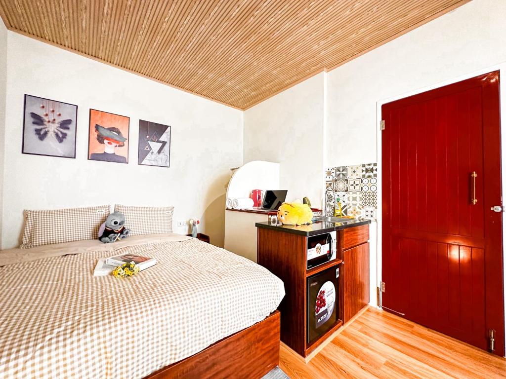 Postel nebo postele na pokoji v ubytování La Casa Di Dicembre 36B Trần Hưng Đạo