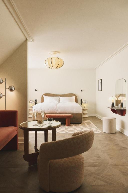 Postel nebo postele na pokoji v ubytování Hotel Bella Grande