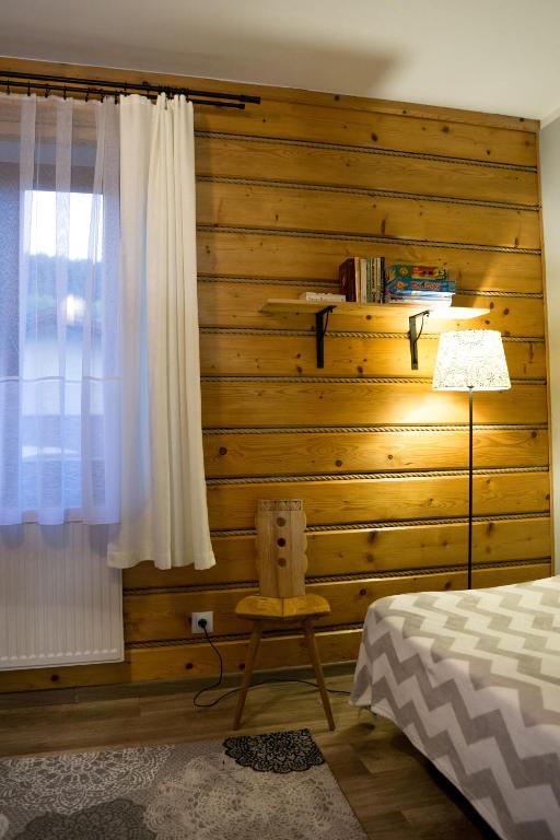 Posteľ alebo postele v izbe v ubytovaní Apartament Jodłowy