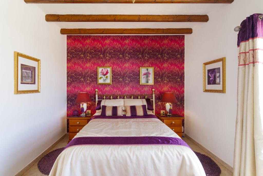 Postel nebo postele na pokoji v ubytování Villa Dune