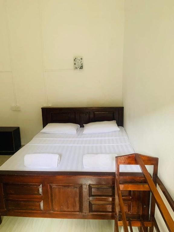 Postel nebo postele na pokoji v ubytování ZIMBAY Guest House