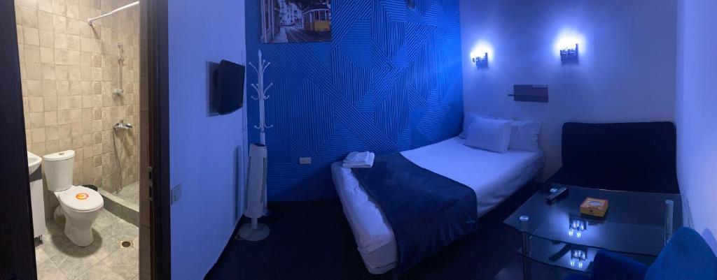 Postel nebo postele na pokoji v ubytování ENIGMA HOSTEL