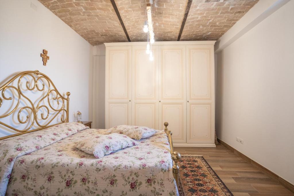 Postel nebo postele na pokoji v ubytování Home at Calascio