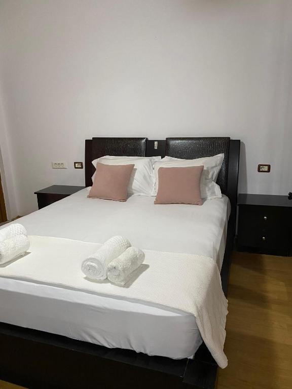 Postel nebo postele na pokoji v ubytování Bertis guest house