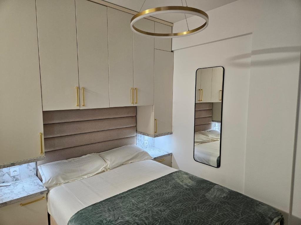 Postel nebo postele na pokoji v ubytování Studio apartman Gold