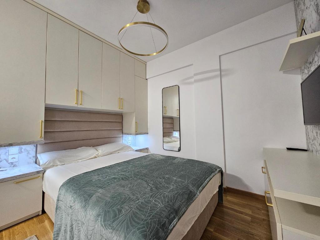 Postel nebo postele na pokoji v ubytování Studio apartman Gold