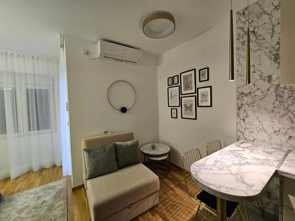 Posezení v ubytování Studio apartman Gold