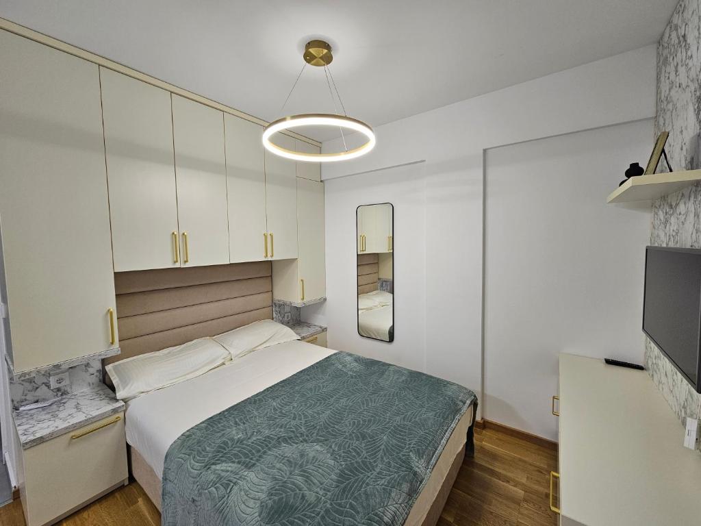 Postel nebo postele na pokoji v ubytování Studio apartman Gold