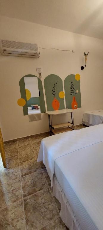 Postel nebo postele na pokoji v ubytování GAYA PANSİYON ÇIRALI