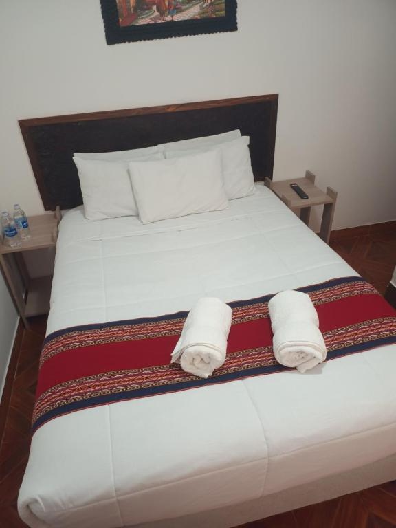 Postel nebo postele na pokoji v ubytování INTI WAYRA MACHUPICCHU