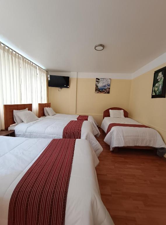 Postel nebo postele na pokoji v ubytování INTI WAYRA MACHUPICCHU