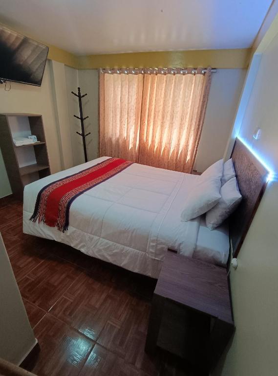 Postel nebo postele na pokoji v ubytování INTI WAYRA MACHUPICCHU