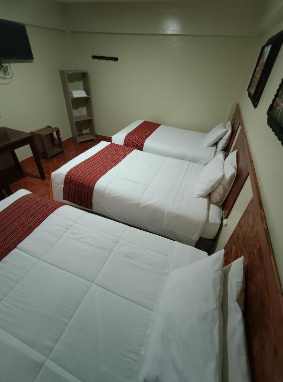 Postel nebo postele na pokoji v ubytování INTI WAYRA MACHUPICCHU