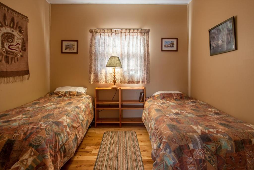 Postel nebo postele na pokoji v ubytování Waterside Apts.