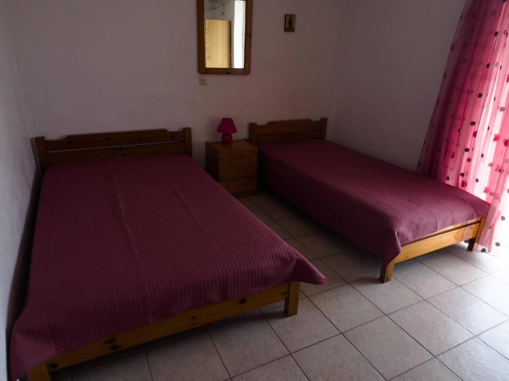 Postel nebo postele na pokoji v ubytování Studios ANNA